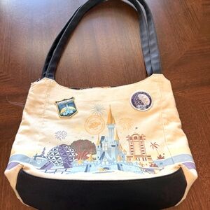 Walt Disney World Parks “Discover the magic 4 parks” collectible purse.
